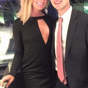 Black Tobi dress with cut out. Size Small